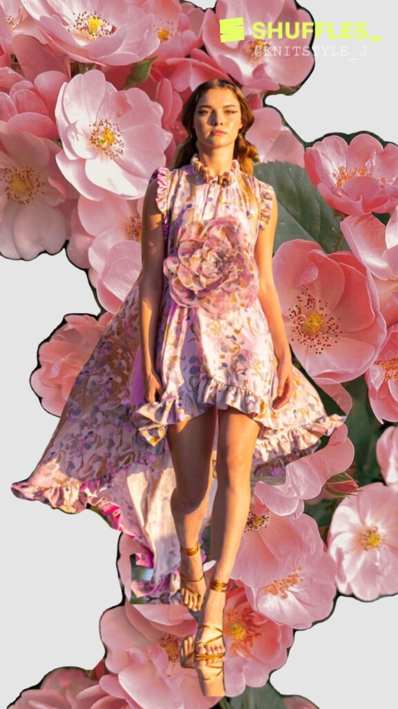 Model in pink floral dress showcasing Spring crochet fashion trends 2023 by Cynthia Rowley: Vibrant and elegant floral fashion from Cynthia Rowley's Spring 2023 Ready to Wear Collection.